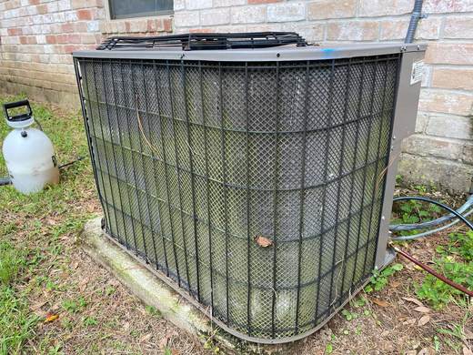 AC condenser with protective cage — Jefferson's AC & Electrical, Tylertown, MS