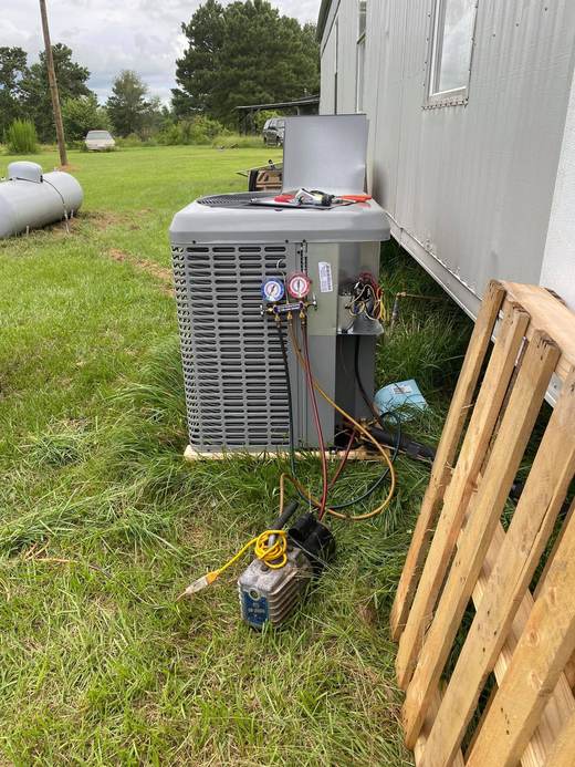 AC condenser install with gauges connected — Jefferson's AC & Electrical, Tylertown, MS