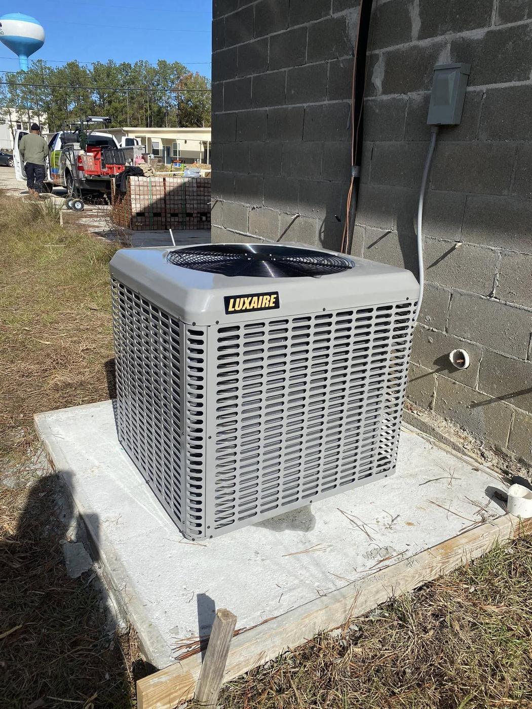Luxaire commercial AC condenser installed by Jefferson's AC & Electrical