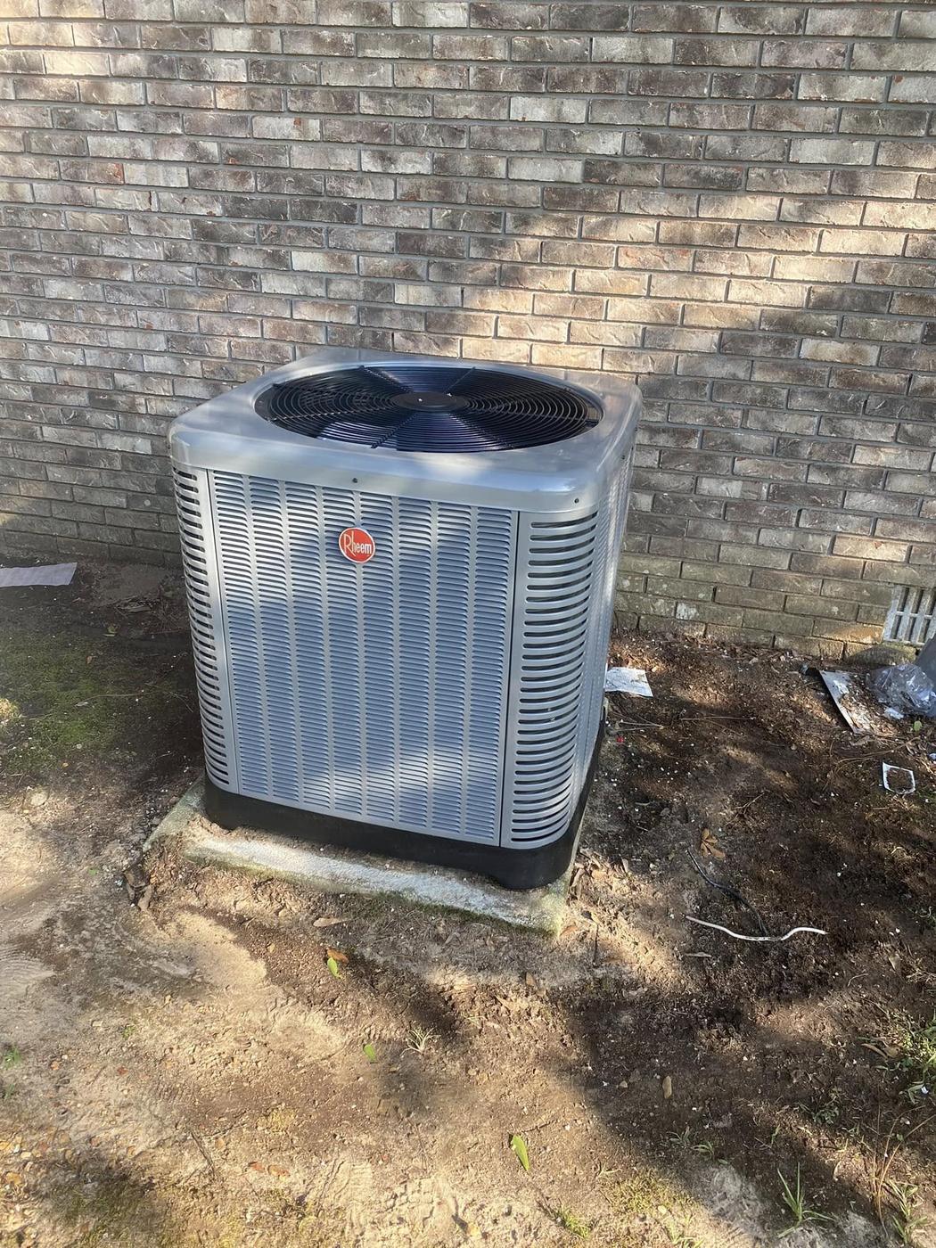 Rheem AC condenser unit installed by Jefferson's AC & Electrical