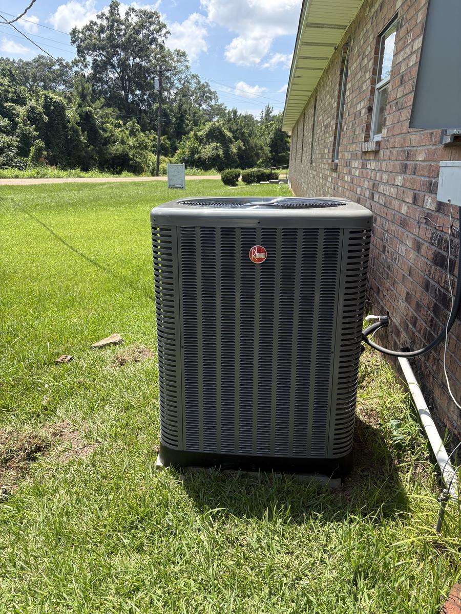 Rheem AC condenser unit installed by Jefferson's AC & Electrical