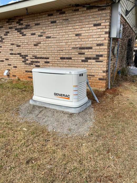Generac standby generator on brick pad — Jefferson's AC & Electrical, Tylertown, MS
