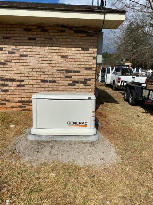 Generac standby generator on concrete pad — Jefferson's AC & Electrical, Tylertown, MS