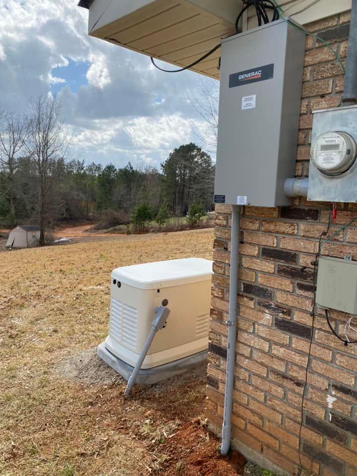 Generac standby generator installed beside a home in Tylertown, MS by Jefferson's AC & Electrical